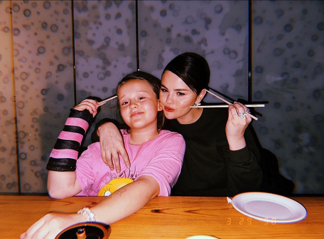 Selena Gomez shares glimpses of her `sissy date night` with sister Grace , The siblings have a 20-year age gap .